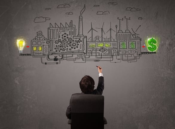 Business man looking at factory that makes money from ideas concept-1